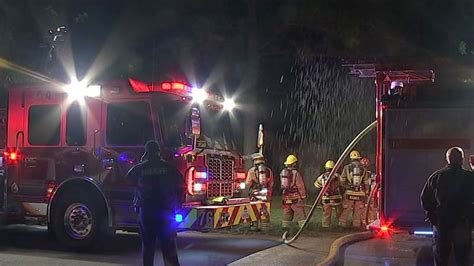 Woman dies after being rescued from mobile home fire